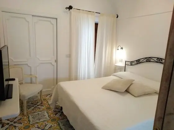 Economy Tek Büyük veya İki Ayrı Yataklı Oda (con terrazzino, senza vista)