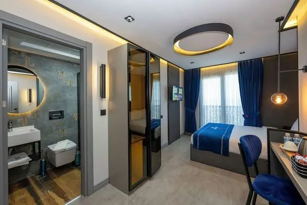 Deluxe Tek Büyük Yataklı Oda