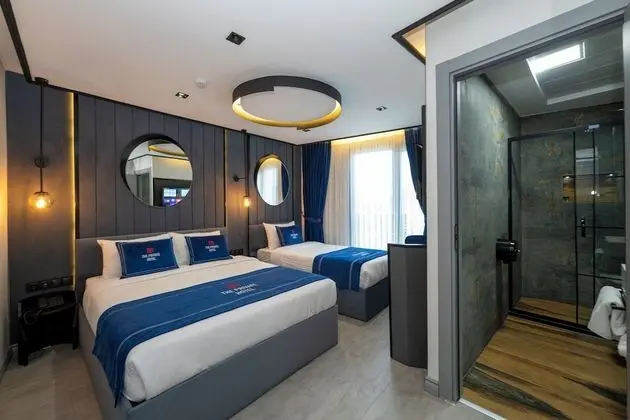 Deluxe Üç Kişilik Oda