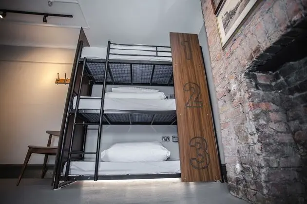 Bed in 9-Bed Female Dormitory with Shared Bathroom