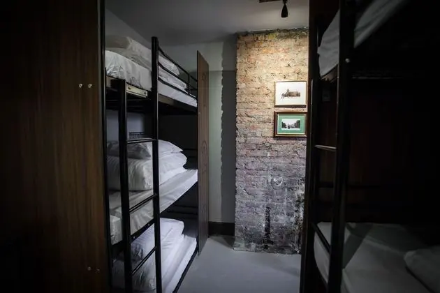 Bed in 9-Bed Female Dormitory with Shared Bathroom