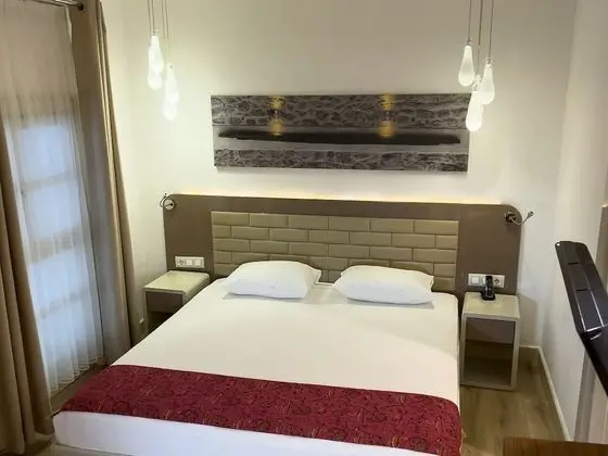 Economy Tek Büyük veya İki Ayrı Yataklı Oda