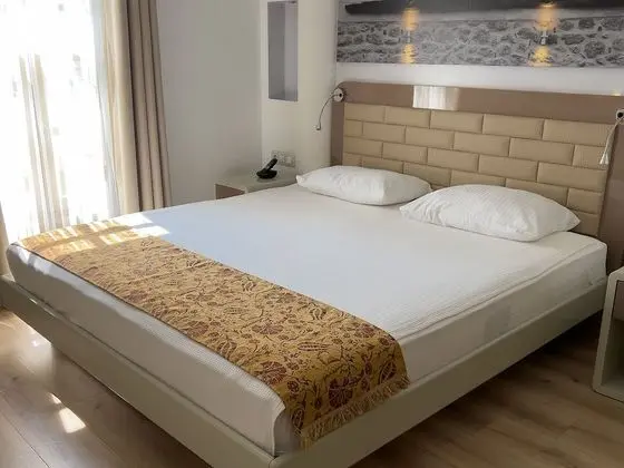 Economy Tek Büyük veya İki Ayrı Yataklı Oda