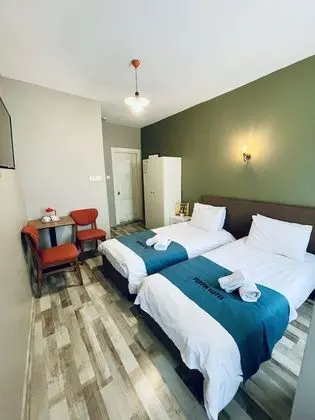 Comfort Tek Büyük veya İki Ayrı Yataklı Oda