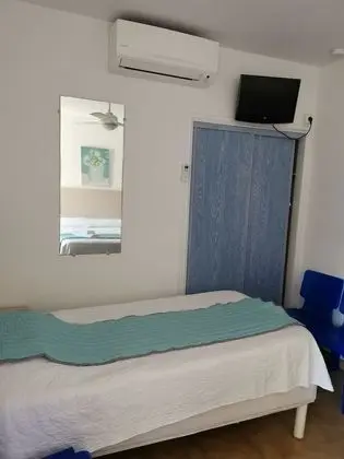 Üç Kişilik Oda, Bahçe Manzaralı