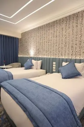 Deluxe Tek Büyük veya İki Ayrı Yataklı Oda