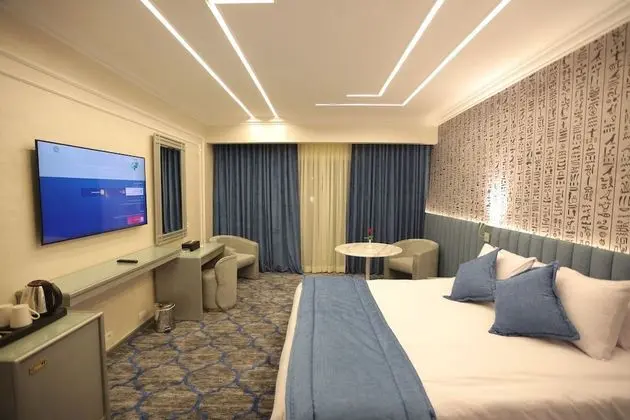 Deluxe Tek Büyük veya İki Ayrı Yataklı Oda
