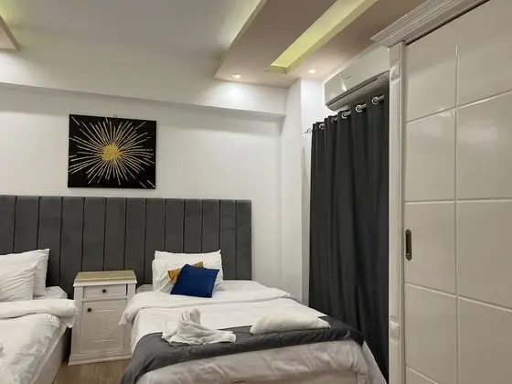 Üç Kişilik Oda