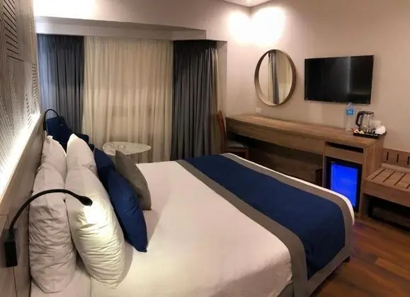 Deluxe Tek Büyük veya İki Ayrı Yataklı Oda