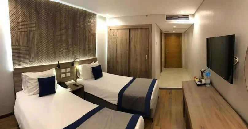 Deluxe Tek Büyük veya İki Ayrı Yataklı Oda