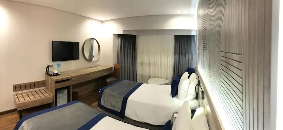 Deluxe Tek Büyük veya İki Ayrı Yataklı Oda