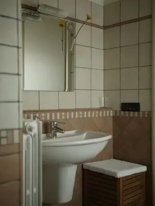 Tek Büyük veya İki Ayrı Yataklı Oda, Bahçe Manzaralı