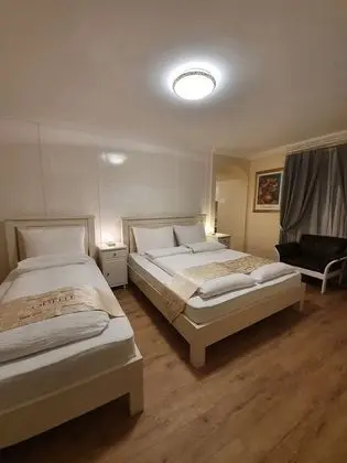 Üç Kişilik Oda