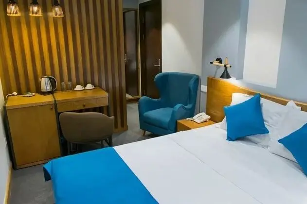 Economy Tek Büyük veya İki Ayrı Yataklı Oda