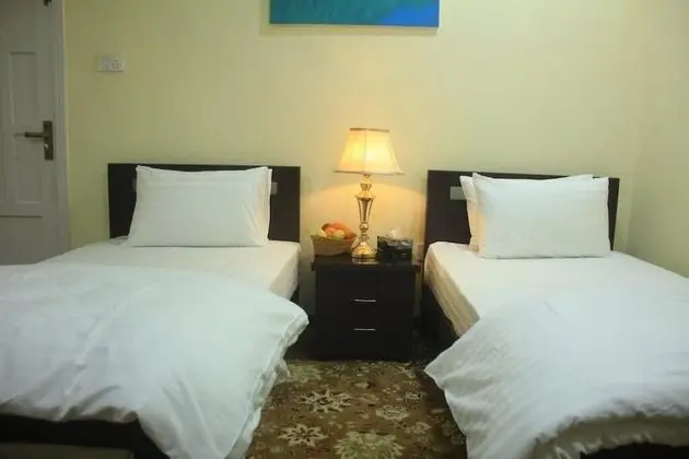 Deluxe Tek Büyük veya İki Ayrı Yataklı Oda