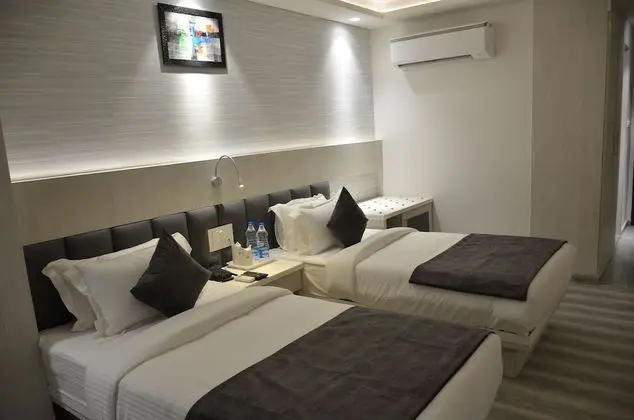 Deluxe Tek Büyük veya İki Ayrı Yataklı Oda