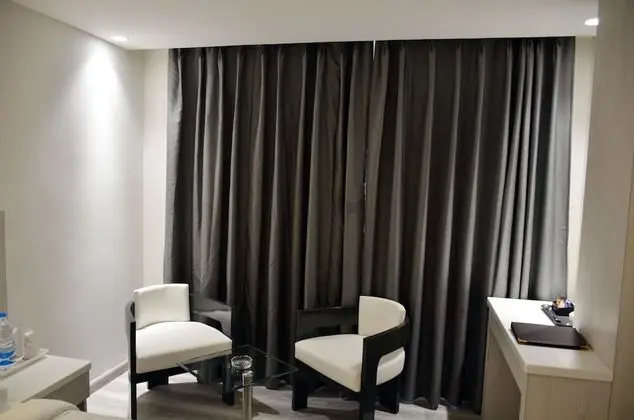 Deluxe Tek Büyük veya İki Ayrı Yataklı Oda