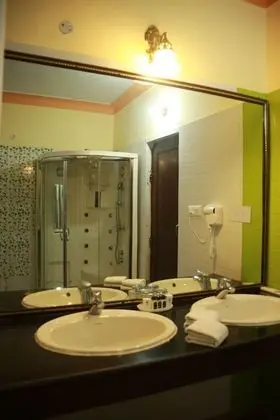 Deluxe Tek Büyük veya İki Ayrı Yataklı Oda