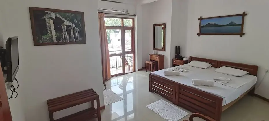 Deluxe Tek Büyük veya İki Ayrı Yataklı Oda