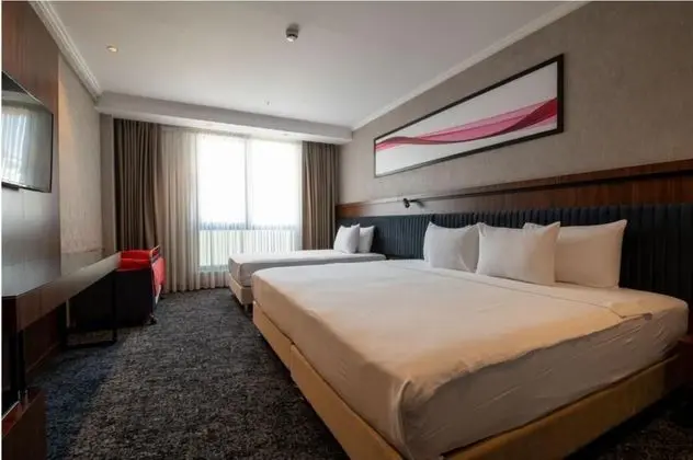 Deluxe Üç Kişilik Oda