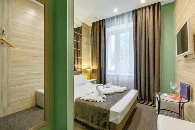 Deluxe Tek Büyük veya İki Ayrı Yataklı Oda