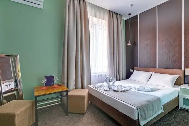 Deluxe Tek Büyük veya İki Ayrı Yataklı Oda