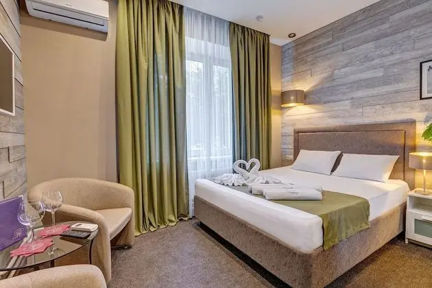 Deluxe Tek Büyük veya İki Ayrı Yataklı Oda