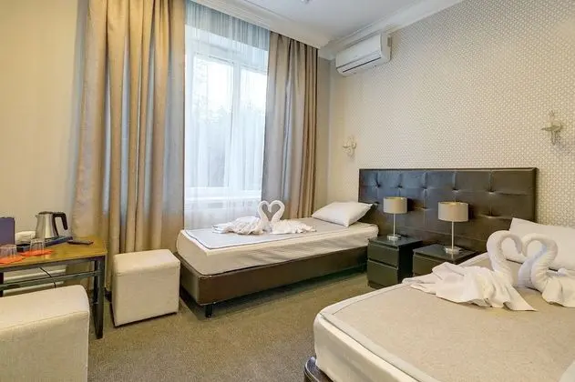 Deluxe Tek Büyük veya İki Ayrı Yataklı Oda