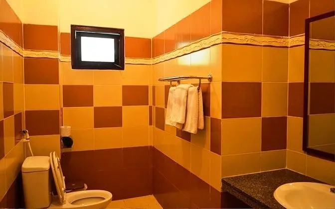 Standard Dört Kişilik Oda, Bahçe Manzaralı