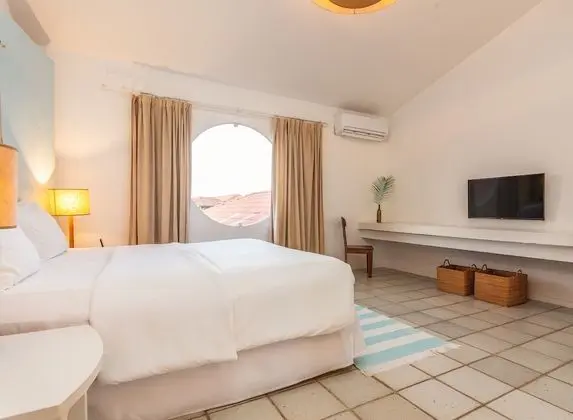 Quarto Standard anexo ao Predio a Frente (Atravessar a rua para acesso dependencias e cafe da manha)