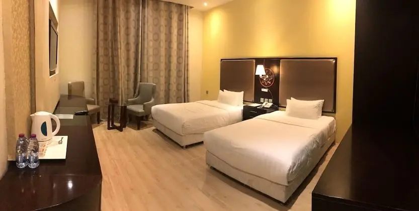 Deluxe Tek Büyük veya İki Ayrı Yataklı Oda