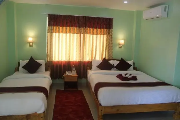 Deluxe Üç Kişilik Oda