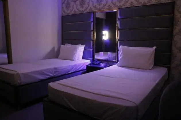 Deluxe Üç Kişilik Oda