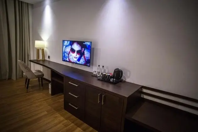 Deluxe Tek Büyük veya İki Ayrı Yataklı Oda
