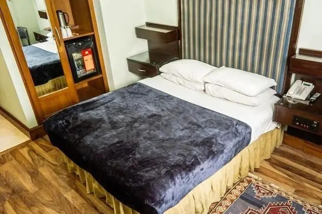 Deluxe Tek Büyük veya İki Ayrı Yataklı Oda