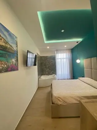 Exclusive Oda, 1 Büyük (Queen) Boy Yatak ve Çekyat, Avlu (Zona vasca idromassaggio)