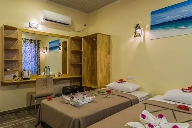 Deluxe Tek Büyük veya İki Ayrı Yataklı Oda
