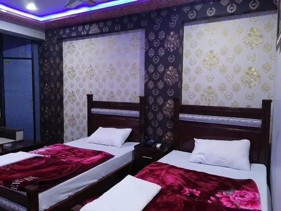 Deluxe Tek Büyük veya İki Ayrı Yataklı Oda