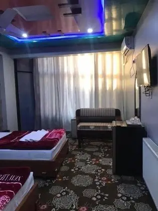 Deluxe Tek Büyük veya İki Ayrı Yataklı Oda