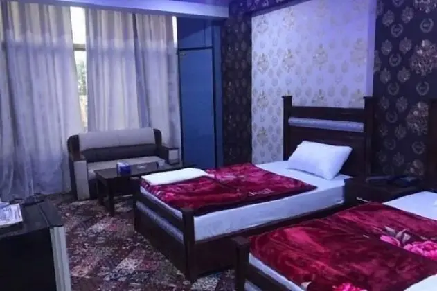 Deluxe Tek Büyük veya İki Ayrı Yataklı Oda