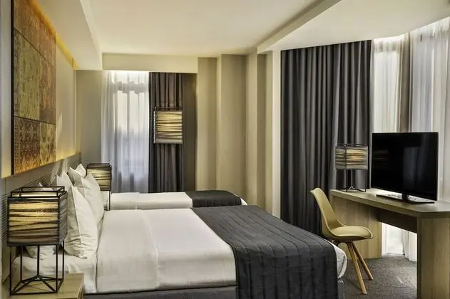 Deluxe Üç Kişilik Oda