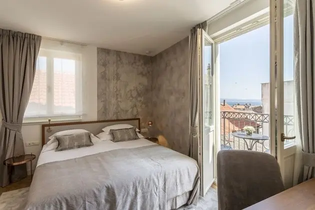 Deluxe Tek Büyük veya İki Ayrı Yataklı Oda