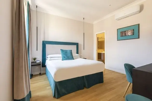 Deluxe Tek Büyük veya İki Ayrı Yataklı Oda