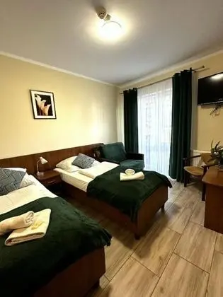Classic Tek Büyük veya İki Ayrı Yataklı Oda