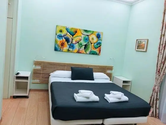 Deluxe Tek Büyük veya İki Ayrı Yataklı Oda