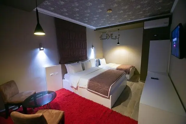 Deluxe Üç Kişilik Oda