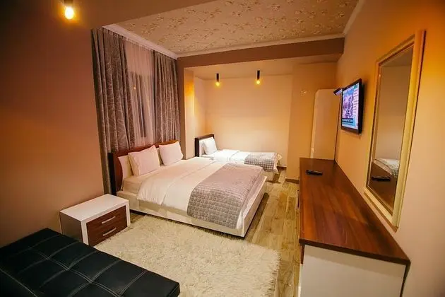 Deluxe Üç Kişilik Oda