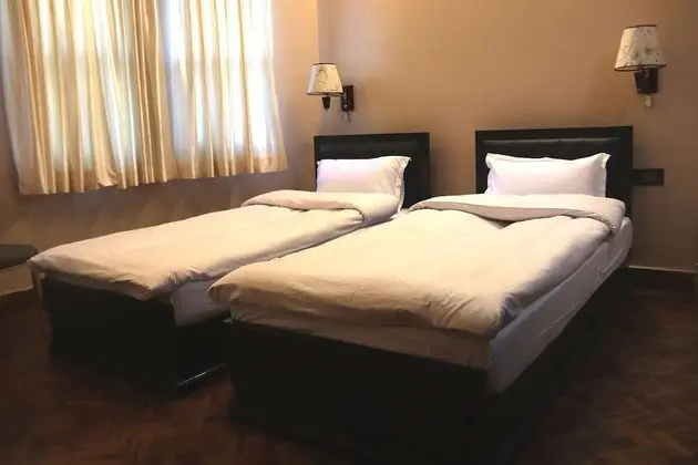 Basic Tek Büyük veya İki Ayrı Yataklı Oda