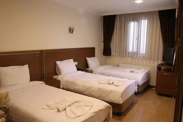 Üç Kişilik Oda