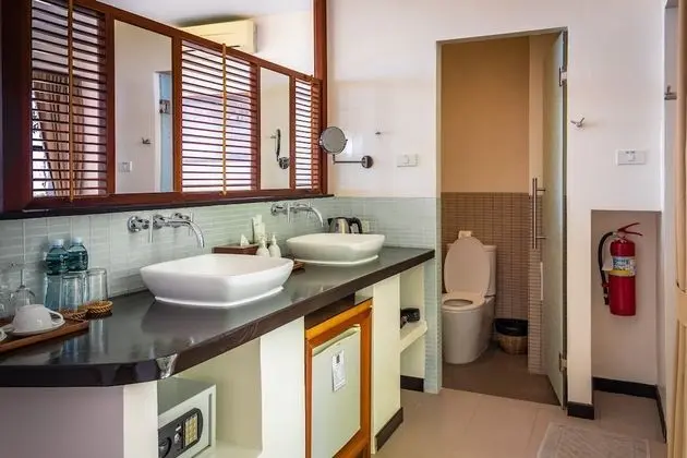 Tek Büyük veya İki Ayrı Yataklı Oda (Pond/Garden Ground Floor )